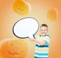 Smiling little boy holding big white text bubble Royalty Free Stock Photo