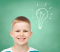 Smiling little boy over green board background Royalty Free Stock Photo