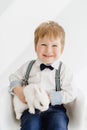 Smiling Little Boy Posing with Rabbit Portrait Royalty Free Stock Photo