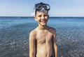 Smiling little boy with scuba mask by the sea Royalty Free Stock Photo