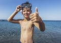 Smiling little boy with scuba mask by the sea Royalty Free Stock Photo