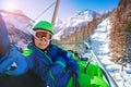 Smiling little boy sit on chair lift, take selfie Royalty Free Stock Photo