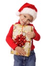 Smiling little boy with yellow Christmas gift box