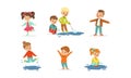 Smiling Little Children Splashing in Puddle Walking in Wet Rainy Day Vector Set Royalty Free Stock Photo