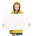 Smiling little girl with blank sheet in hands