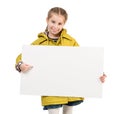 Smiling little girl with blank sheet in hands