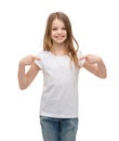 Smiling little girl in blank white t-shirt