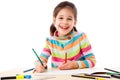 Smiling little girl draw with crayons Royalty Free Stock Photo