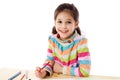 Smiling little girl draw with crayons Royalty Free Stock Photo