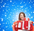 Smiling little girl with gift boxes Royalty Free Stock Photo