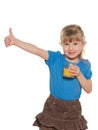 Smiling little girl with a glass of orange juice Royalty Free Stock Photo