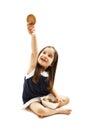 Smiling little girl holding a bowl with cookie or biscuit Royalty Free Stock Photo