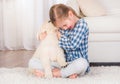 Smiling girl hugging retriever puppy Royalty Free Stock Photo