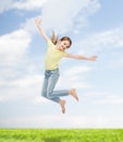 Smiling little girl jumping Royalty Free Stock Photo