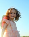 Smiling little girl on meadow Royalty Free Stock Photo