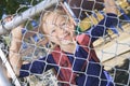 A smiling little girl at school playground Royalty Free Stock Photo