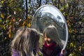 Little girl staring at her reflection in mirror Royalty Free Stock Photo