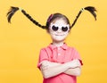 Smiling little girl with sunglasses