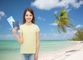 Smiling little girl with ticket and passport Royalty Free Stock Photo