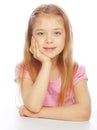 Smiling little girl on white background in studio Royalty Free Stock Photo