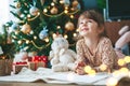 Smiling little girl writing a letter to Santa Claus Royalty Free Stock Photo