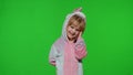 Little kid girl daughter in unicorn pajamas using speaking talking on mobile cell phone with mother Royalty Free Stock Photo