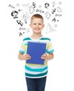 Smiling little student boy with blue book Royalty Free Stock Photo