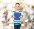 Smiling little student boy with blue book Royalty Free Stock Photo