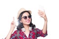 Smiling lovely active asian girl taking selfie photo. Royalty Free Stock Photo