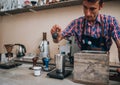 Smiling male barista is preparing espresso at coffee shop Royalty Free Stock Photo