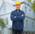 Smiling male builder or manual worker in helmet Royalty Free Stock Photo