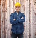 Smiling male builder or manual worker in helmet Royalty Free Stock Photo