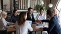 Male colleagues handshake closing deal in office Royalty Free Stock Photo