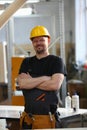 Smiling male construction worker in helmet in uniform Royalty Free Stock Photo