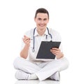 Smiling male doctor with a clipboard Royalty Free Stock Photo