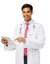 Smiling Male Doctor Holding Digital Tablet