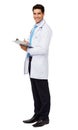 Smiling Male Doctor Writing On Clipboard Royalty Free Stock Photo