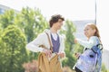 Smiling male and female students at college campus Royalty Free Stock Photo