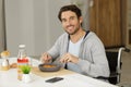 smiling male handicapped eating lunch Royalty Free Stock Photo