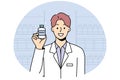 Smiling male pharmacist holding medication