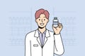 Smiling male pharmacist holding medication