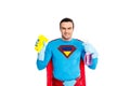 smiling male superhero holding rag and spray bottle with detergent