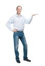 Smiling man in blue shirt and jeanse isolated on white background Royalty Free Stock Photo