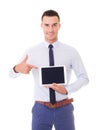 Smiling man in blue shirt with tablet computer Royalty Free Stock Photo