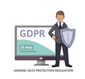 Smiling man in business suit with a shield in front of computer monitor showing GDPR date. General data protection