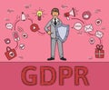 Smiling man in business suit with a shield among social media and internet items. Personal data. GDPR, RGPD, DPO, DSGVO