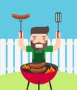 Smiling man cooking barbecue outdoor