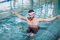 Smiling man doing underwater bike Royalty Free Stock Photo