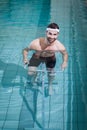 Smiling man doing underwater bike Royalty Free Stock Photo