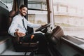 Smiling Man Driving Tour Bus. Professional Driver Royalty Free Stock Photo
